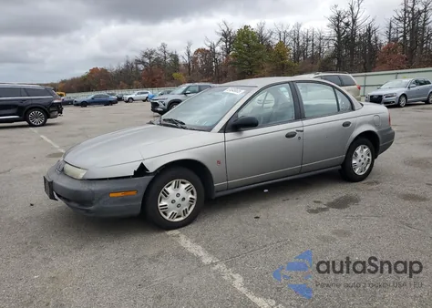 1999 Saturn Sl1 from USA, damaged, VIN 1G8ZH5284XZ187243